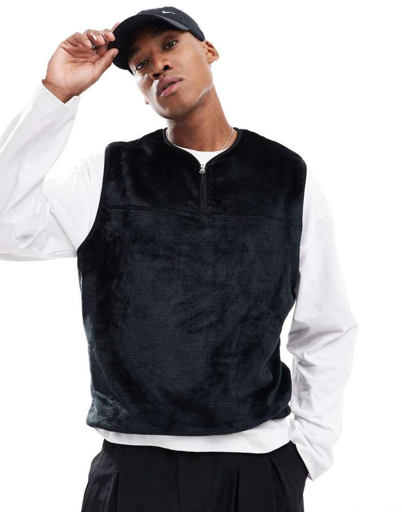 ASOS ASOS DESIGN oversized quarter zip faux fur vest in black 1