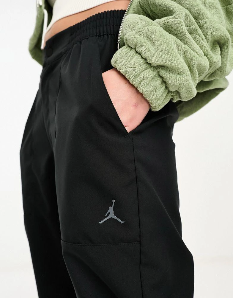 Jordan Jordan core woven track joggers in black 2