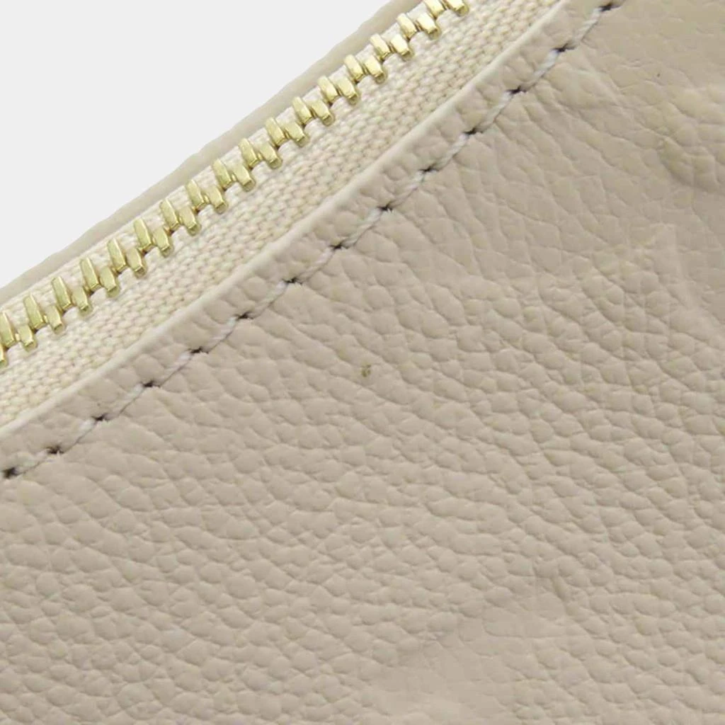 Louis Vuitton Louis Vuitton mini moon claim Monogram Empreinte Leather 5