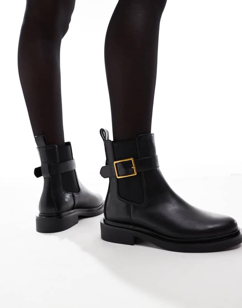 ASOS ASOS DESIGN Wide Fit Aurora flat boots with buckle strap in black
