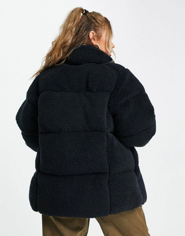 Columbia Columbia Puffect sherpa unisex puffer jacket in black Exclusive at ASOS 2