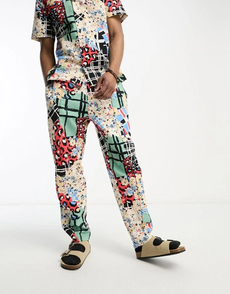 ASOS ASOS MADE IN KENYA tapered trouser in cut about graphic print 1