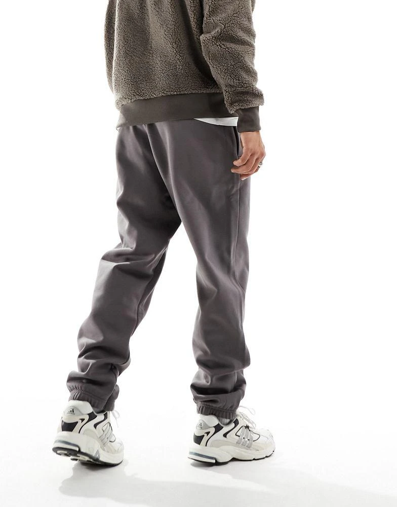 Adidas adidas Basketball One joggers in dark brown 2