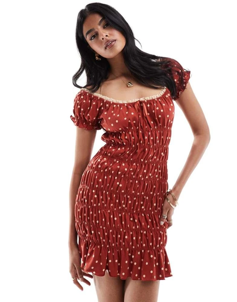 ASOS ASOS DESIGN polka dot shirred mini tea dress with tie front in red 1