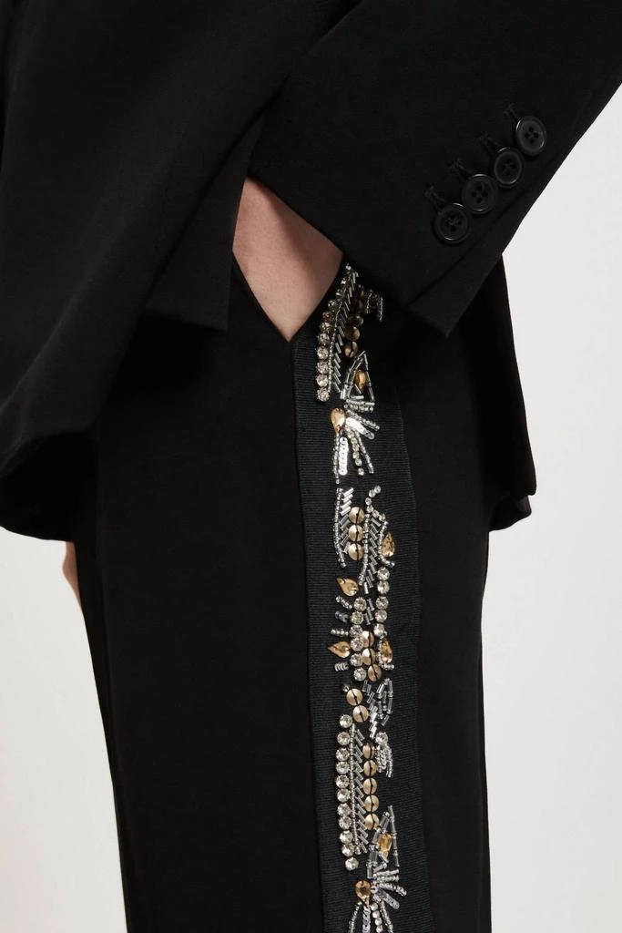 Ottod
Ame Ottod
Ame - Embroidered Palazzo Trousers 4