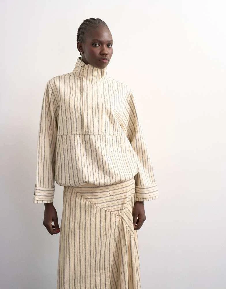 Topshop Topshop denim bubble hem top with funnel neck in ecru stripe