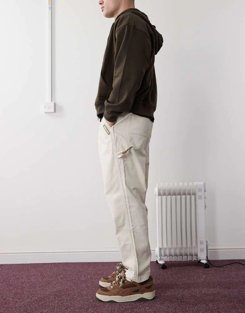 AAPE Aape by A Bathing Ape loose fit worker jeans in off white 3