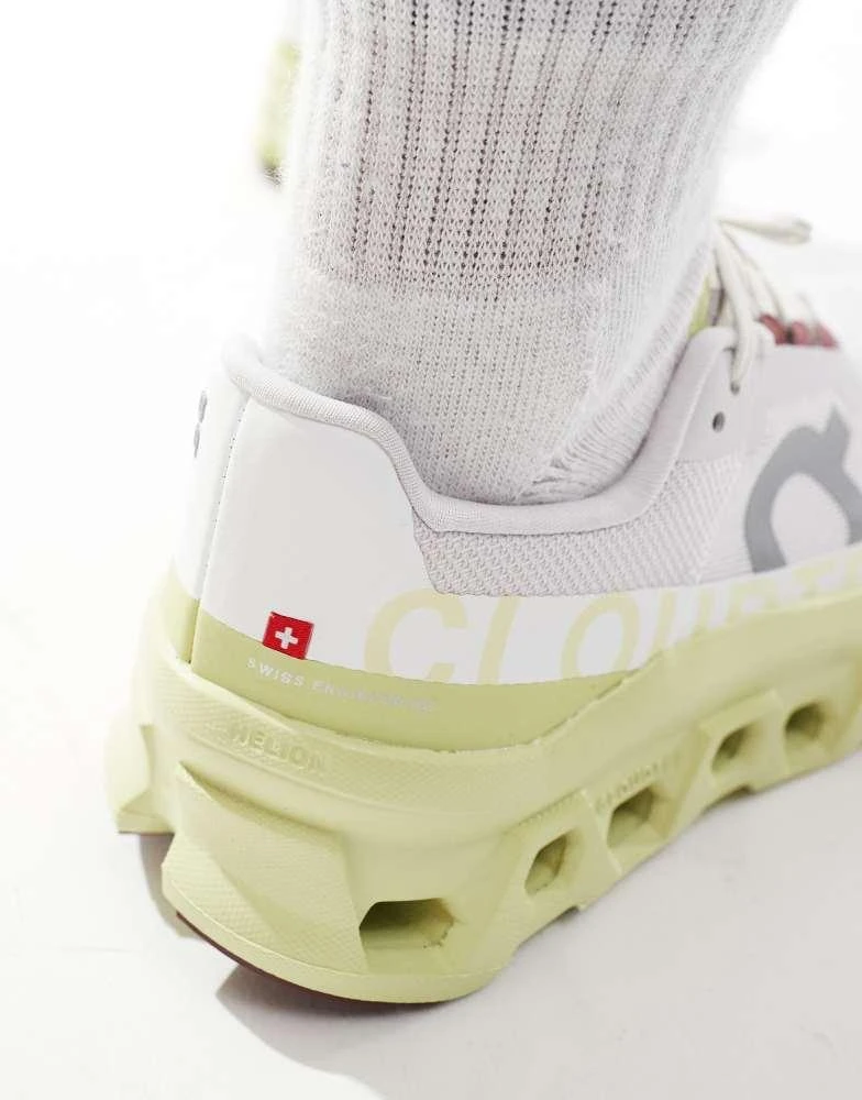 On ON Cloudmonster running trainers in white and yellow 4
