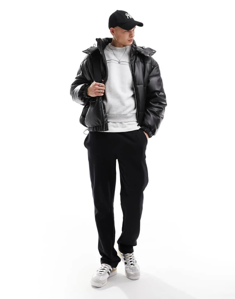 Bershka Bershka detachable hooded faux leather puffer in black 2