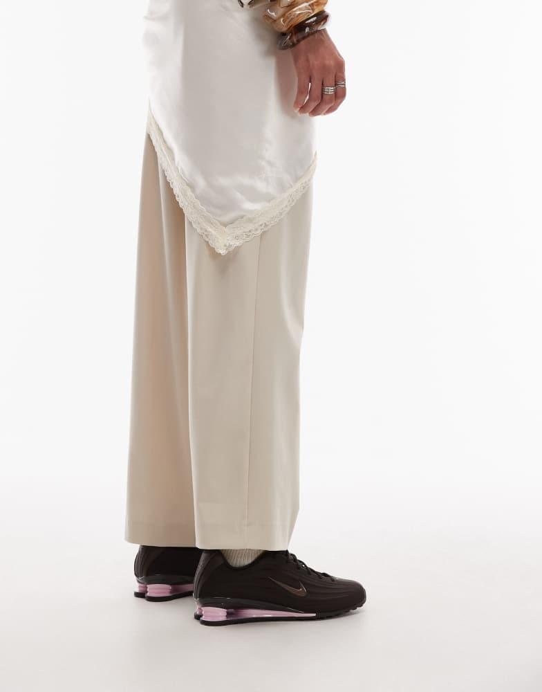 Shop Nike Shox Z trainers in brown and pink on Sale at BeyondStyle