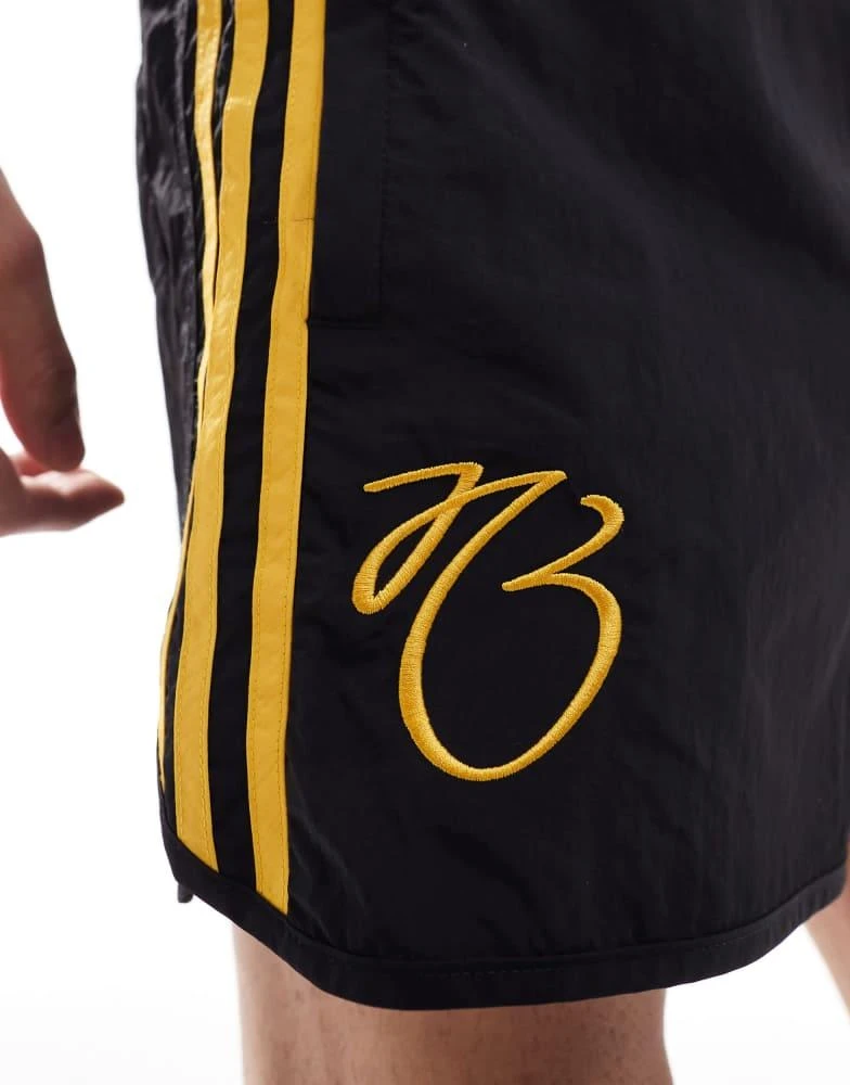 Adidas adidas Originals Jude Bellingham shorts in black and gold 3