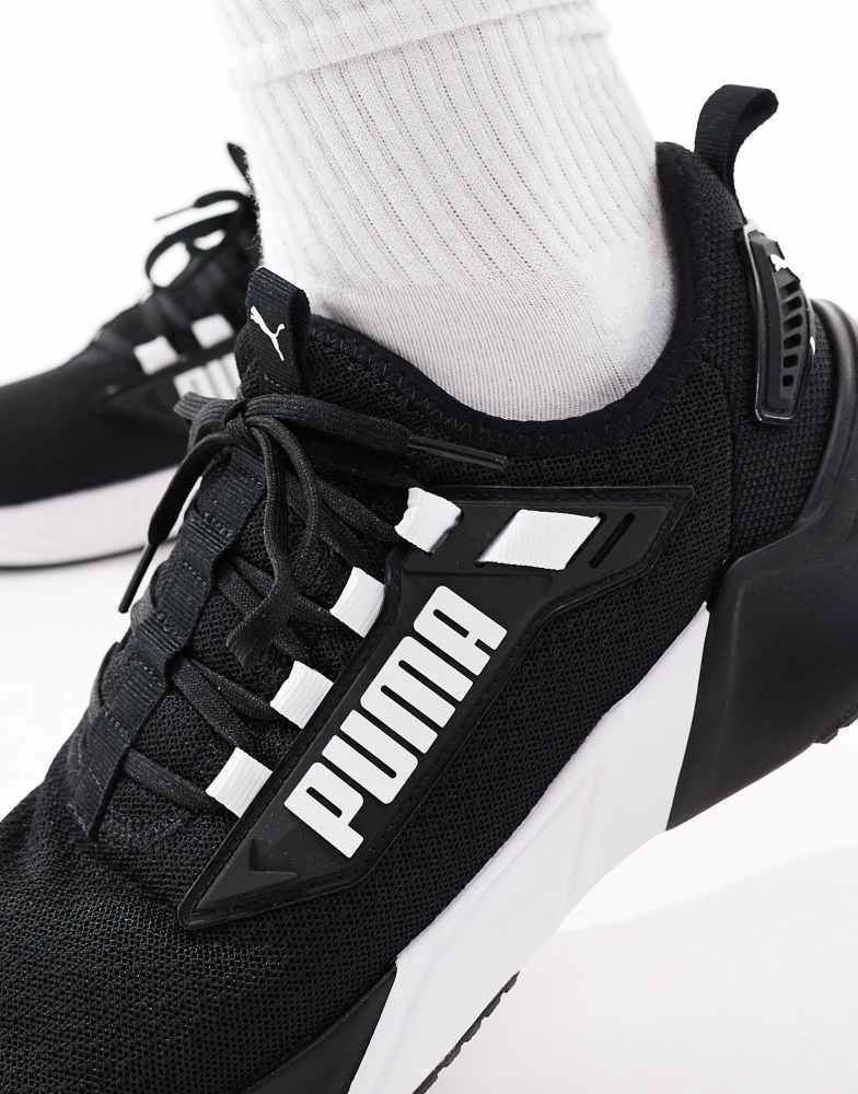 Puma Puma Retaliate 3 trainers in black & white 4