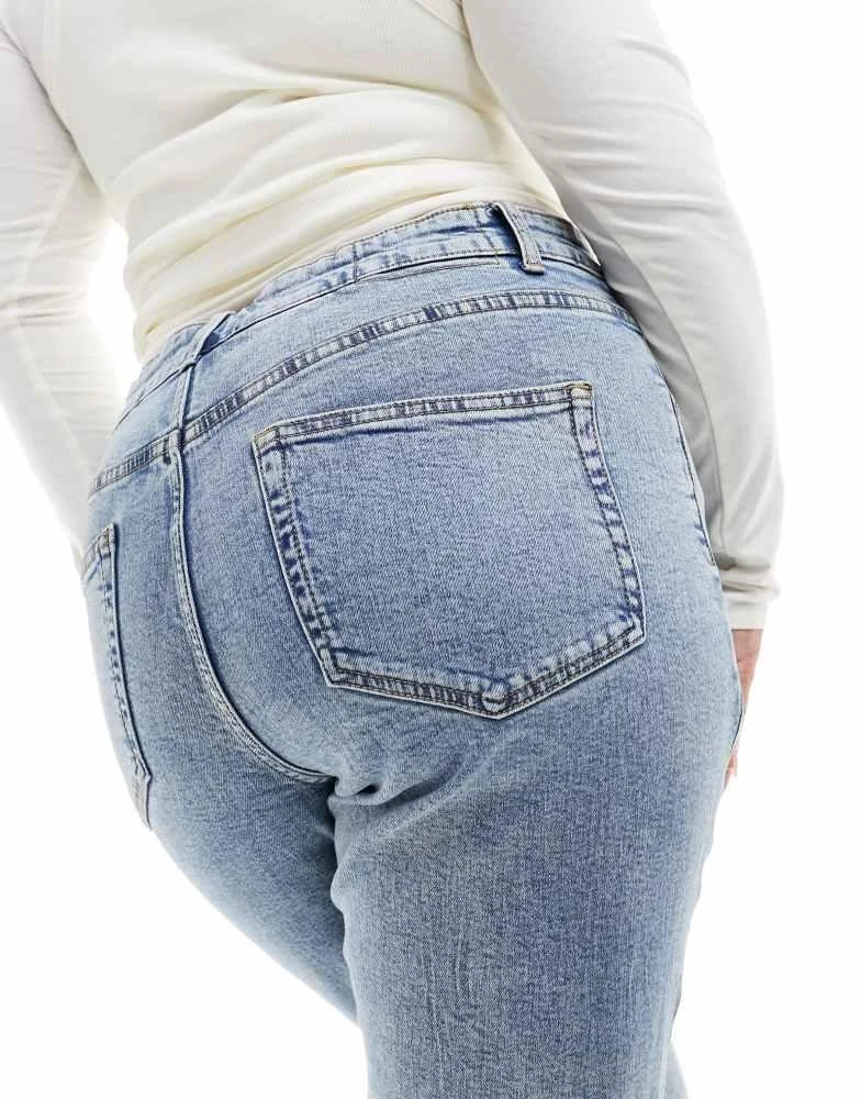 ASOS ASOS DESIGN Curve slim fit comfort mom jeans in mid blue 4
