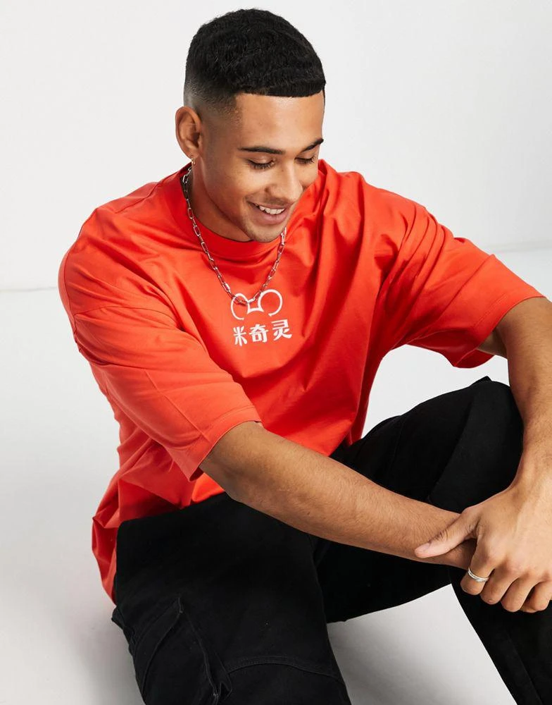ASOS ASOS DESIGN oversized t-shirt with Disney Mickey Mouse print in red 2