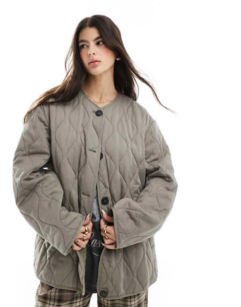 ASOS ASOS DESIGN dolphin hem collarless quilted jacket in khaki 2