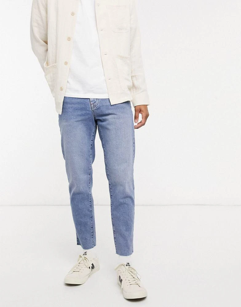 ASOS DESIGN ASOS DESIGN classic rigid jeans in vintage light wash blue with raw hem