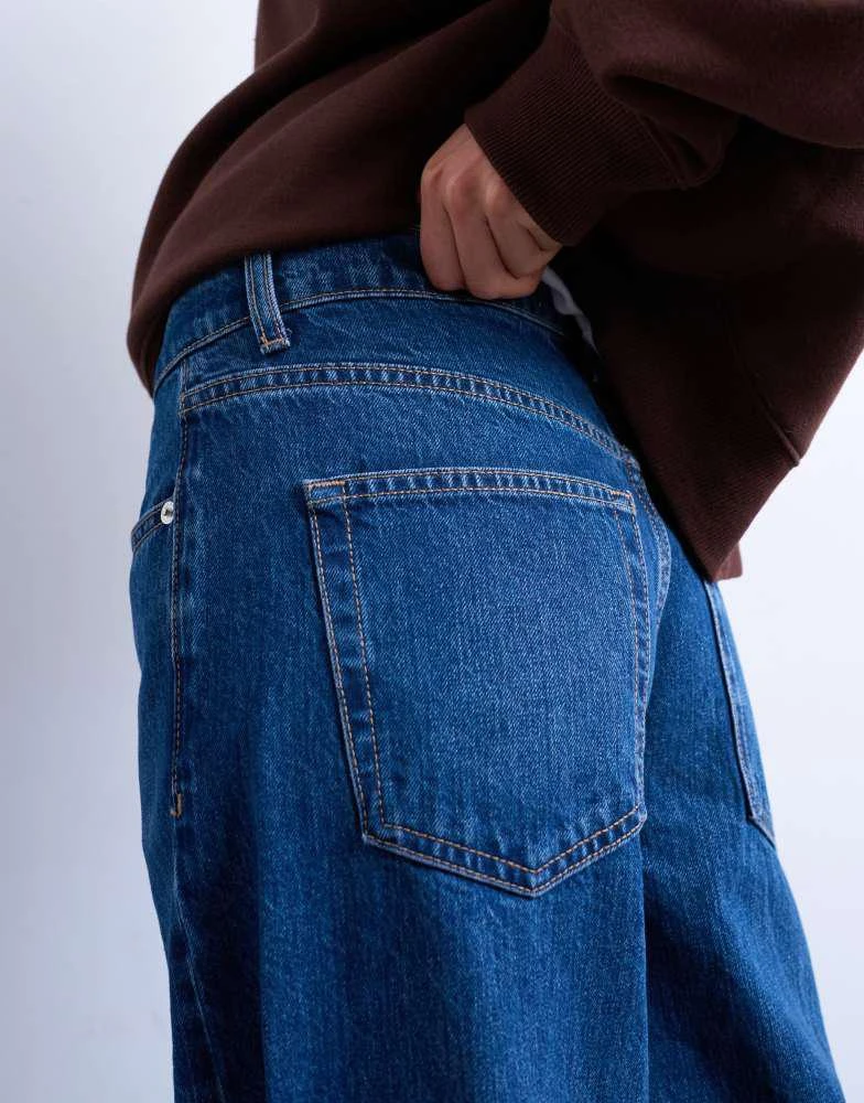 Topshop Topshop Horizon mid rise wide leg jean with raw hem in rich blue 4