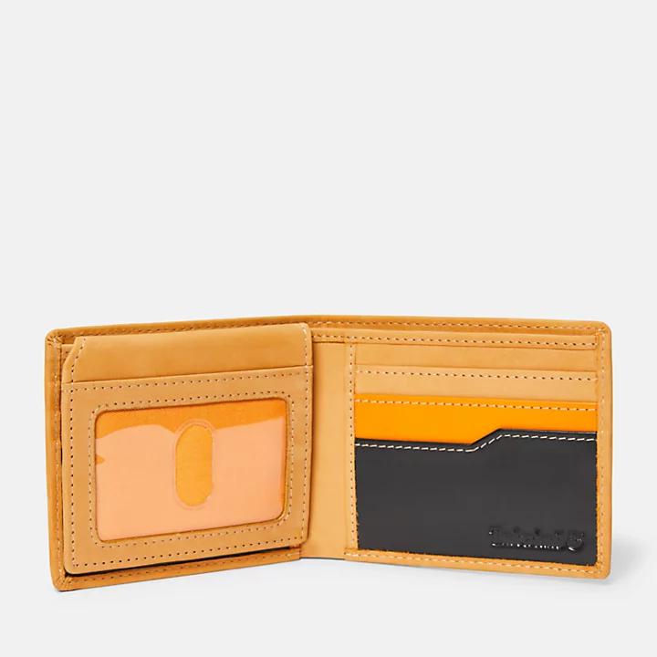 Timberland All-over Embossed Logo Passcase for Men in Yellow