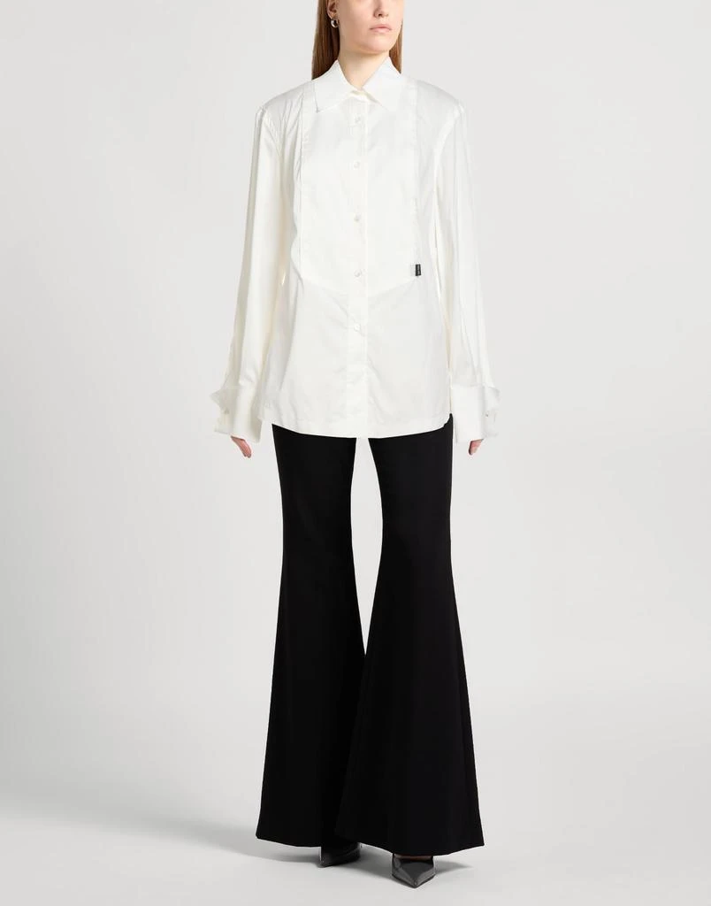 Tom Ford Solid color shirts
blouses 2