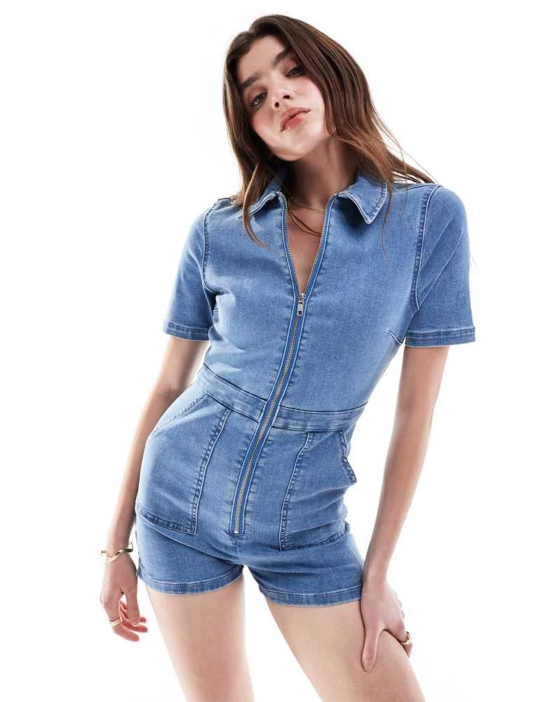 ASOS ASOS DESIGN denim short sleeve playsuit with zip through in midwash blue 1