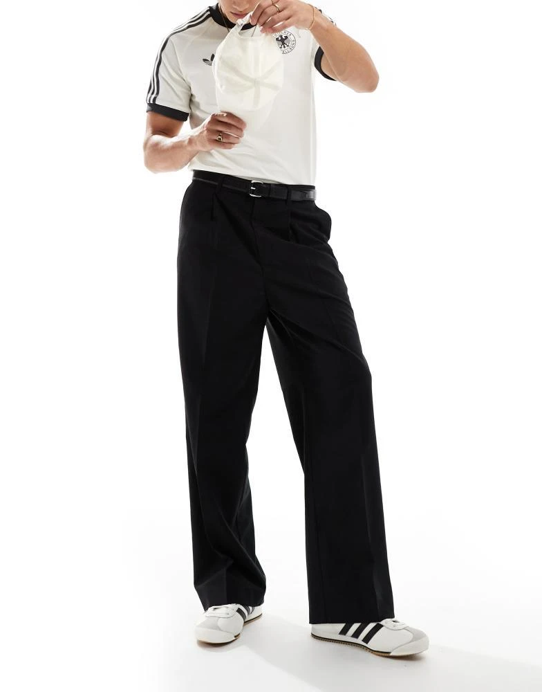 Weekday Weekday Uno loose fit tailored trousers in black 1