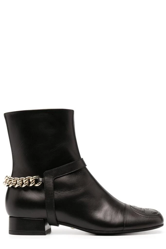 Gucci Gucci Logo Embossed Ankle Boots 1