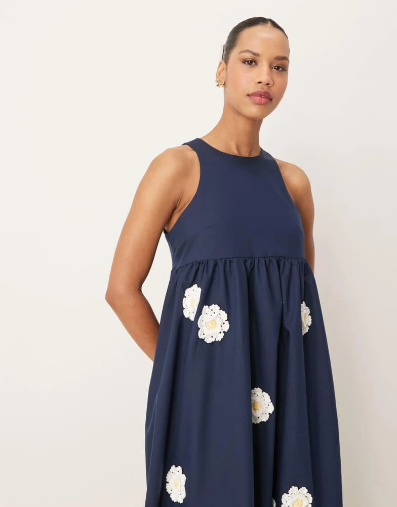 Shop Dream Sister Jane empire waist embroidered flower midi dress in navy  on Sale at BeyondStyle  Get 20% Off Dream Sister Jane empire waist  embroidered flower midi dress in navy with