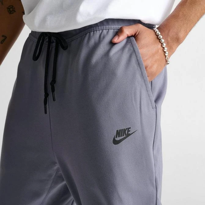 NIKE Men's Nike Sportswear Tech Knit Lightweight Jogger Pants 9