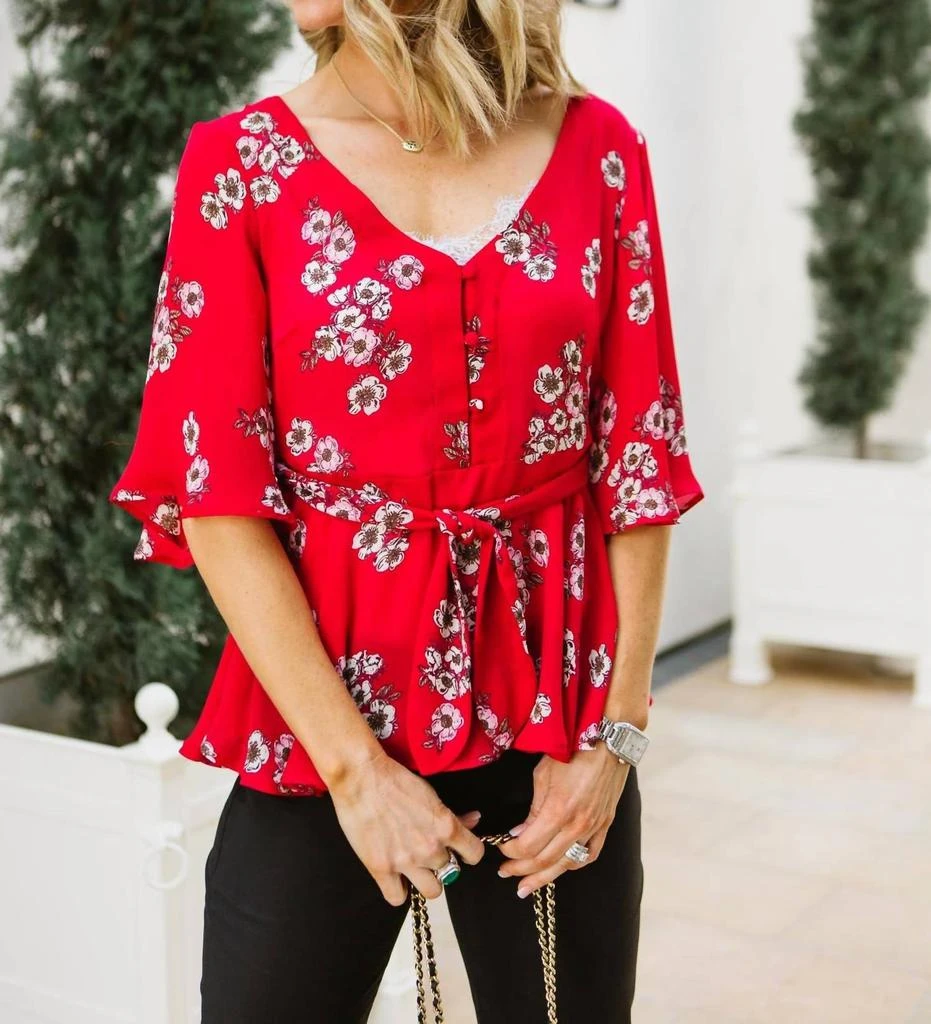 cupcakes and cashmere Tipton Wrap Blouse In Red Floral 1