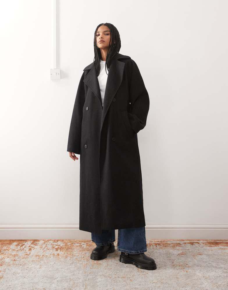 Monki Monki longline belted trench coat in black - Coats - Compare