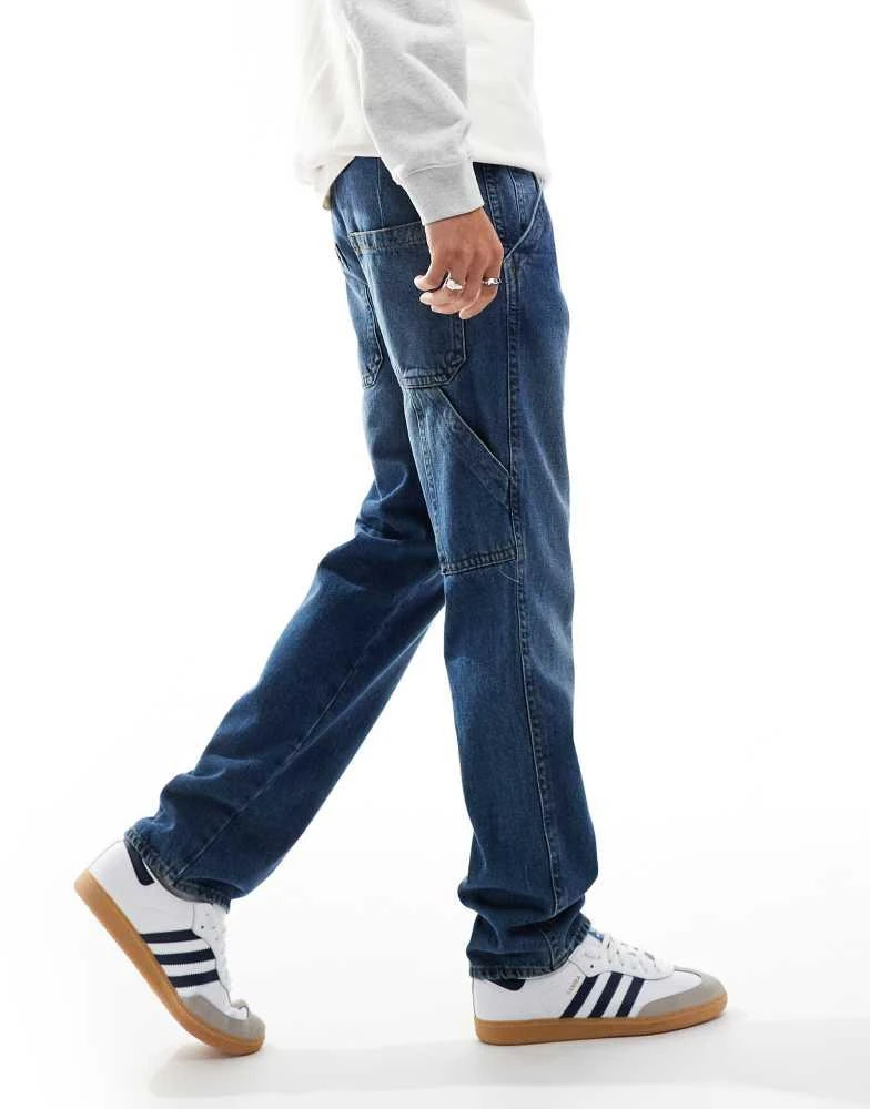 ASOS ASOS DESIGN straight leg jeans with carpenter detail in mid wash blue 2