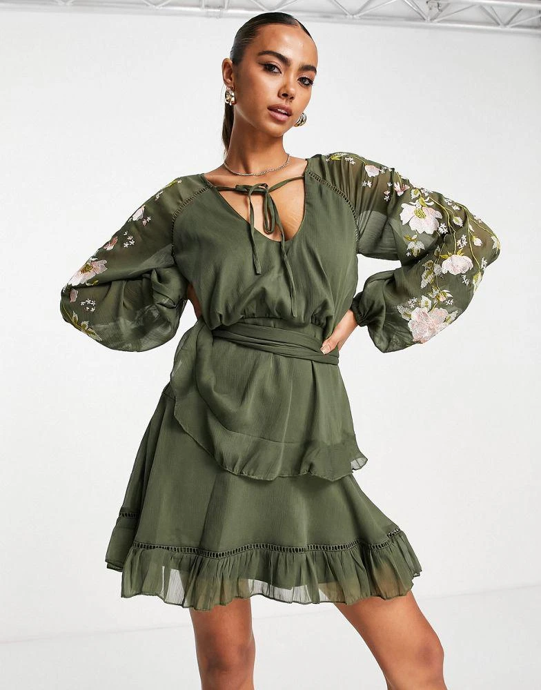 ASOS DESIGN ASOS DESIGN blouson sleeve tiered mini dress with cross stitch embroidery detail and tie in khaki 1