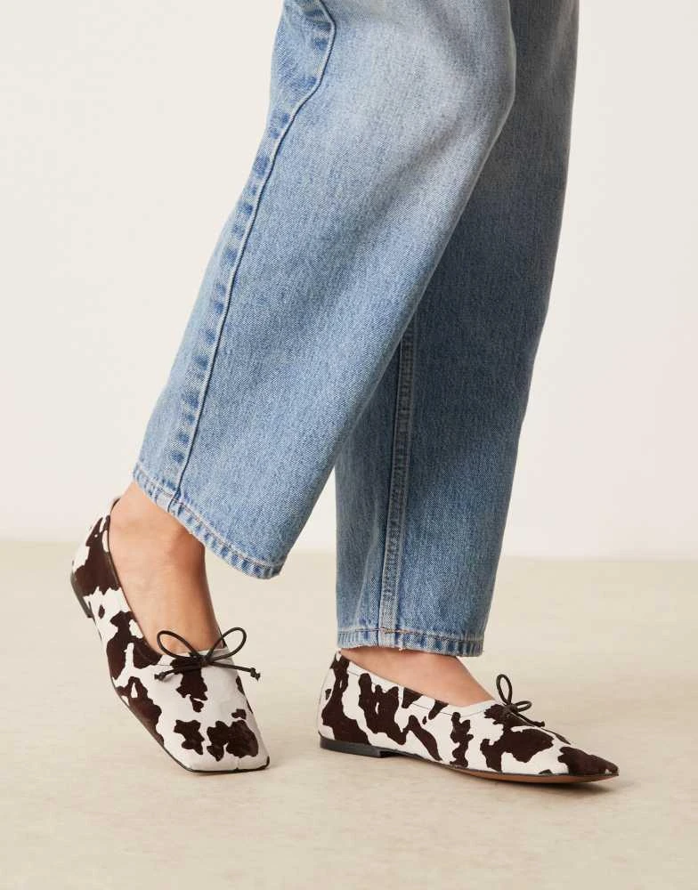 ASOS ASOS DESIGN Lotus premium suede ballets in cow print 1