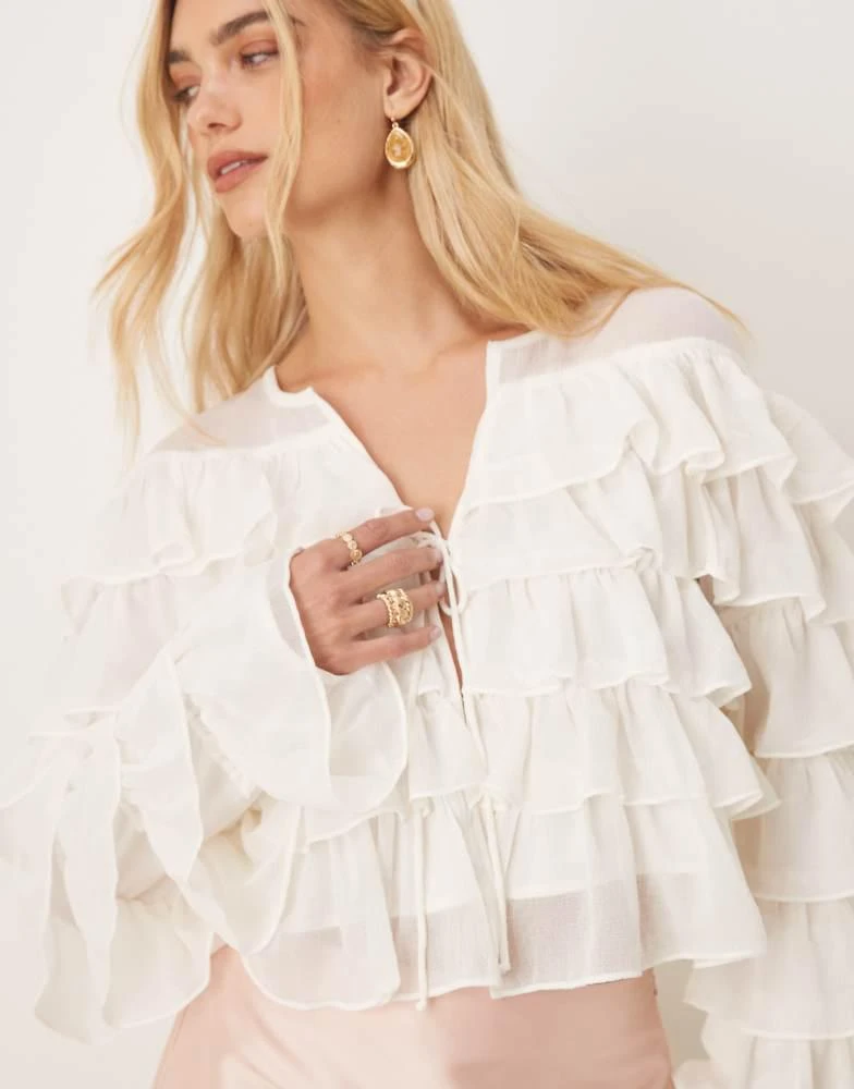 GINA TRICOT Gina Tricot long sleeve cropped flounce ruffle blouse with tie front in off white 4