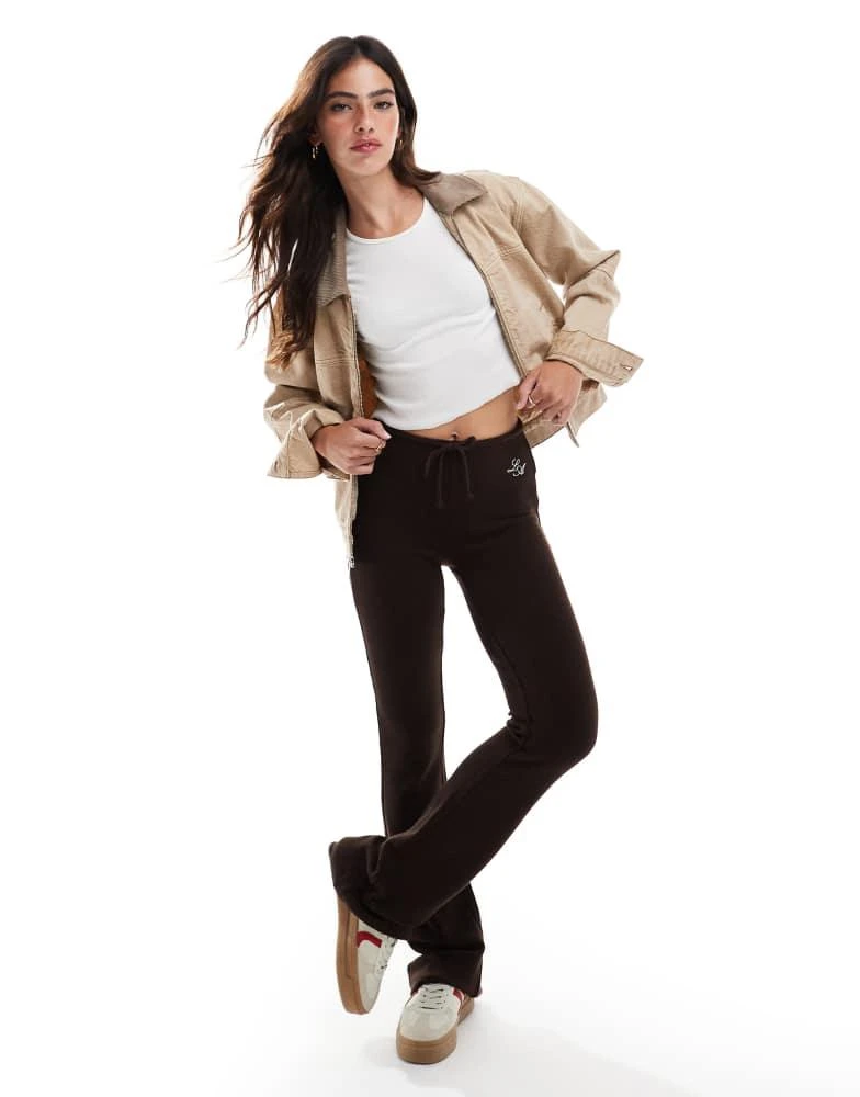 PacSun Pacsun waffle textured flared trousers in coffee bean brown 1