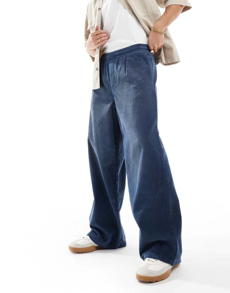 ASOS ASOS DESIGN super baggy cord trousers in washed blue 1