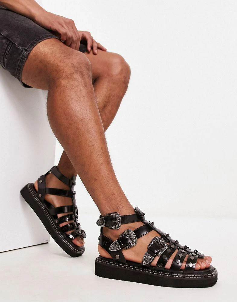 ASOS ASOS DESIGN chunky gladiator sandals in black leather with western detailing 1
