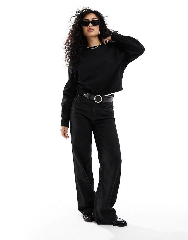 & Other Stories & Other Stories sweatshirt with bold shoulder and pleated cuffs  in black 3