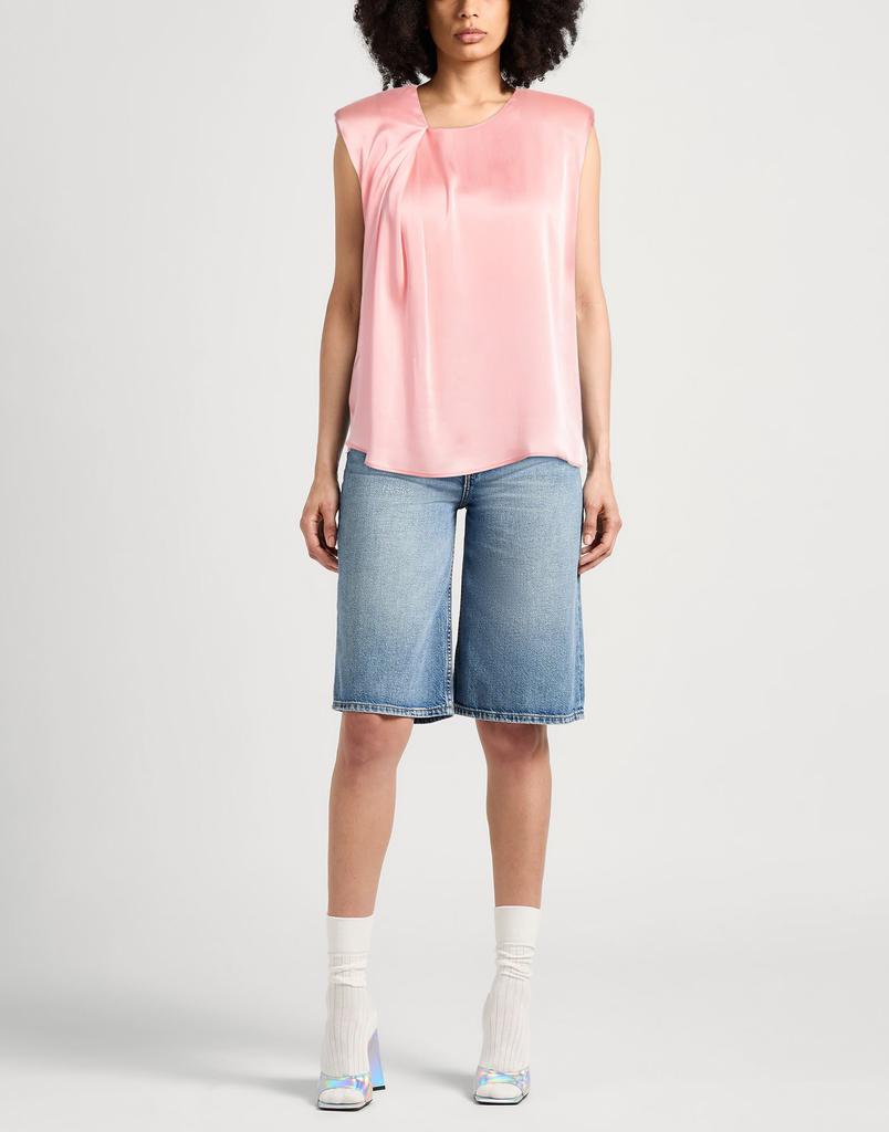 CARACTÈRE Top