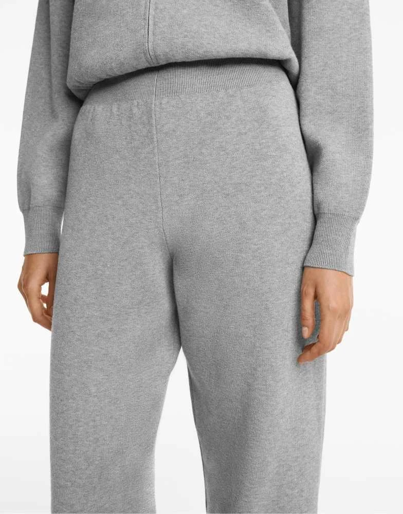 OYSHO OYSHO Half-zip long knit jumpsuit in black 4