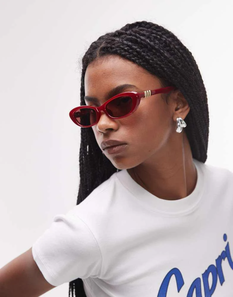Le Specs Le Specs the whisperer oval sunglasses in garnet red 1
