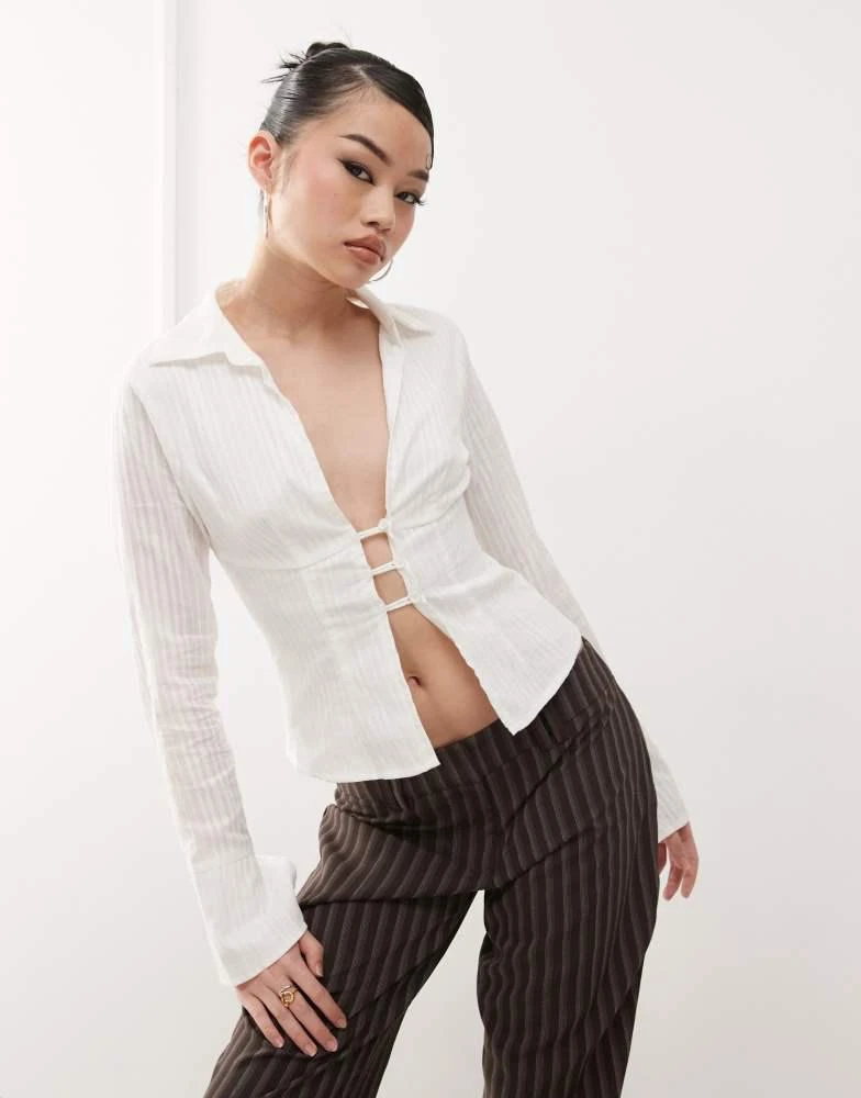 Princess Polly Princess Polly 90s textured stripe flare sleeve plunge collared shirt in white 1