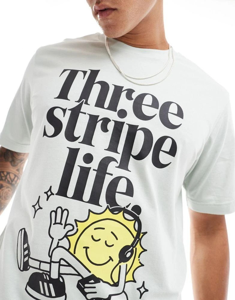 Adidas adidas Training t-shirt with three stripe life graphic in green 2