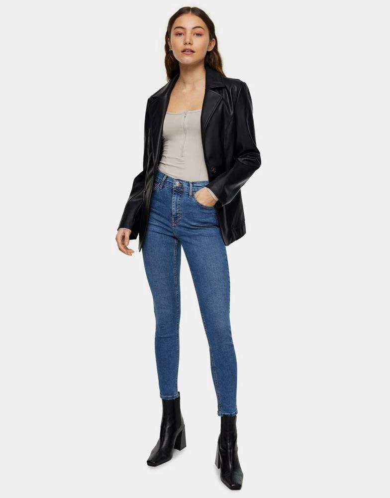 Topshop Topshop Jamie jeans with abraided hem detailing in mid blue  3