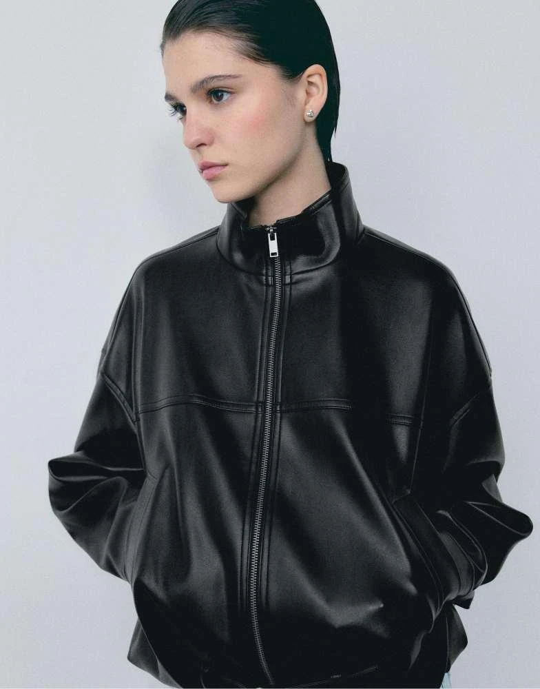 Stradivarius Stradivarius Leather effect balloon jacket with belt in black