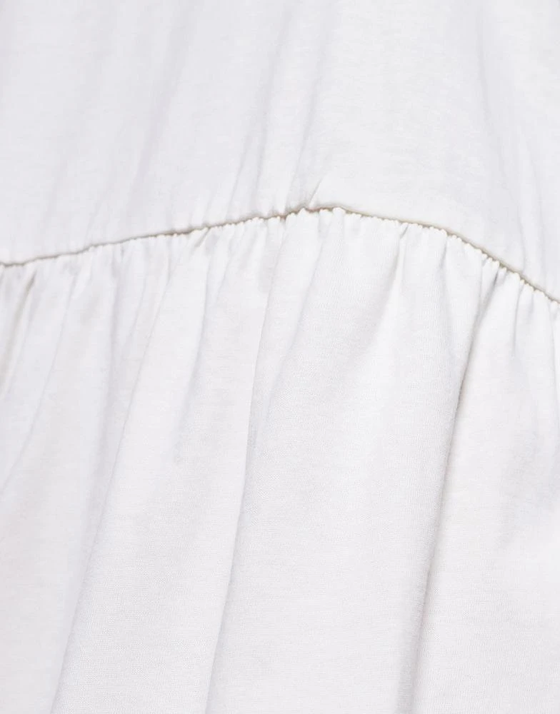 ASOS ASOS DESIGN short sleeve dropped waist peplum t-shirt mini dress in cream 4