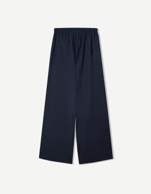 Bershka Bershka Linen blend trousers with an elasticated waistband in navy