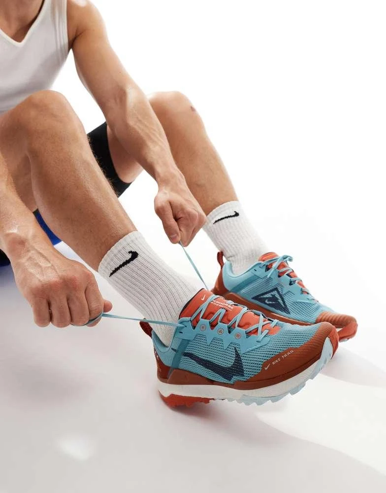 NIKE Nike Running React Wildhorse 8 trainers in light blue and orange 4