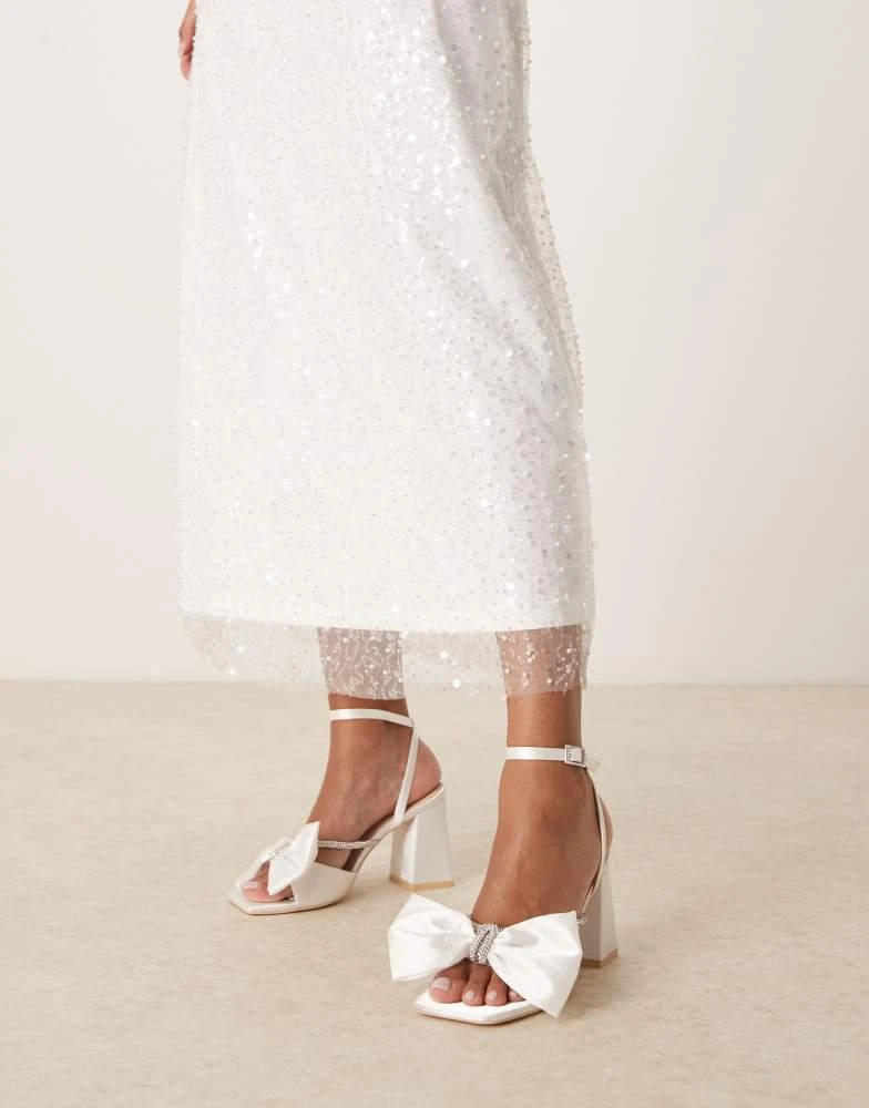 Be Mine Be Mine Tisca high block heeled sandals with bow in satin ivory 3