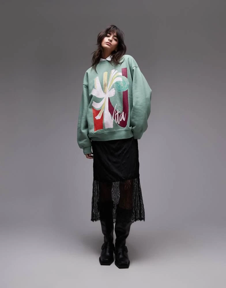 Topshop Topshop oversized washed sweatshirt with abstract graphic in green 2